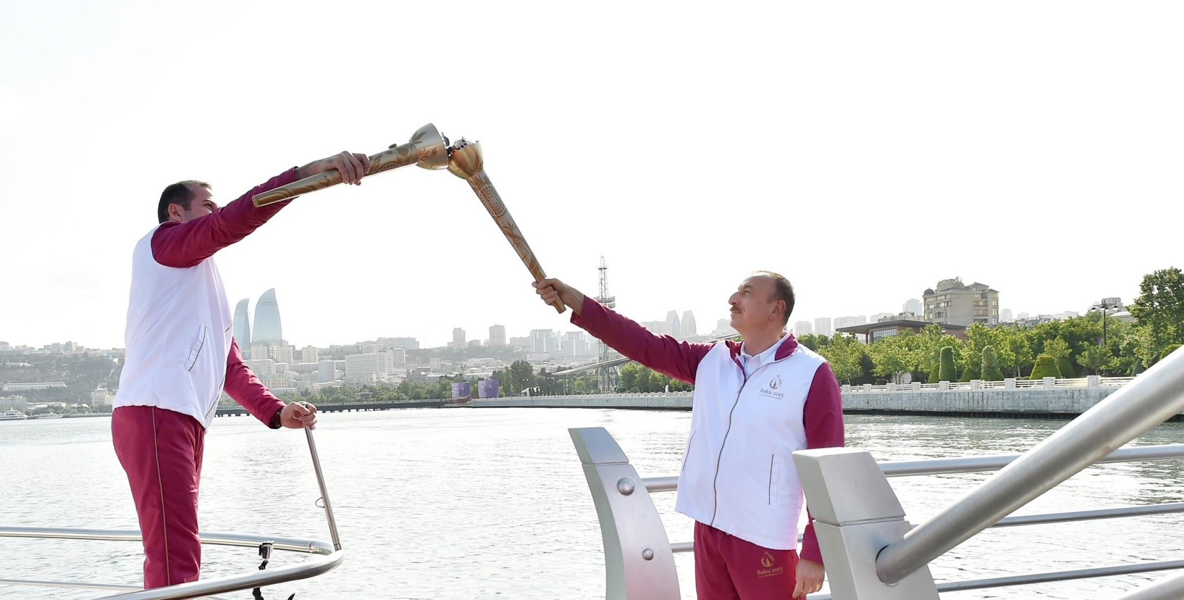 Ильхам Алиев принял факел «Баку-2015» на причале «Садко» в Приморском национальном парке