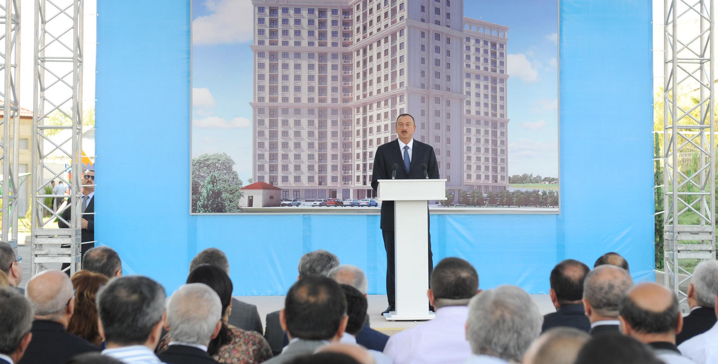 Ilham Aliyev attended a ceremony to distribute apartments in a building for journalists