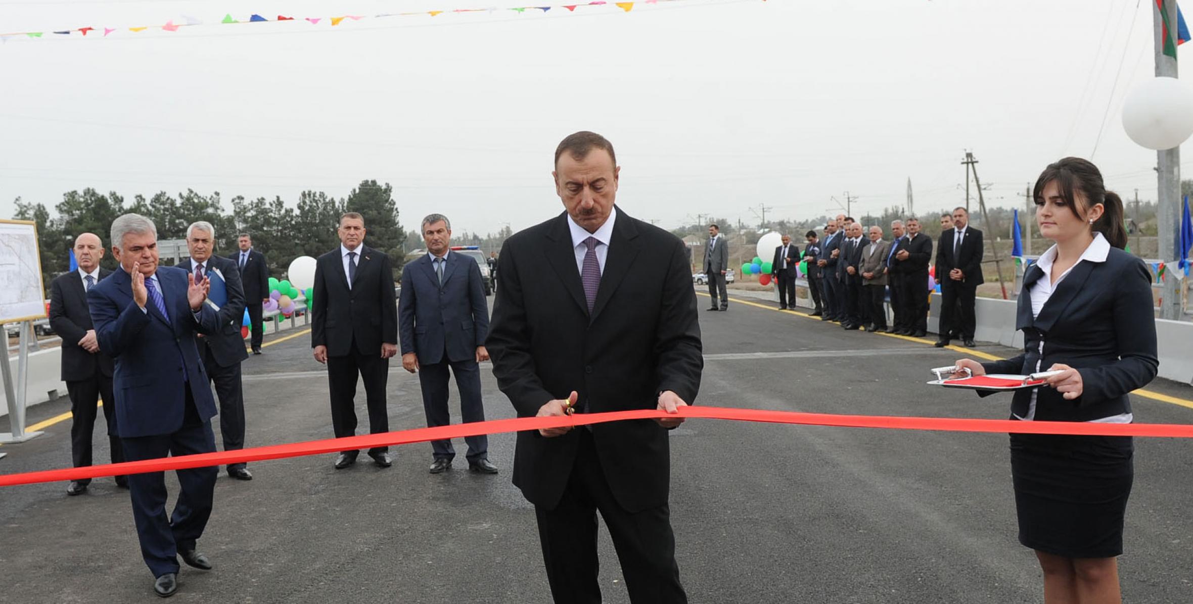 Ilham Aliyev attended the opening of a reconstructed bridge over the River Araz on the Saatli-Musali-Mazrali road