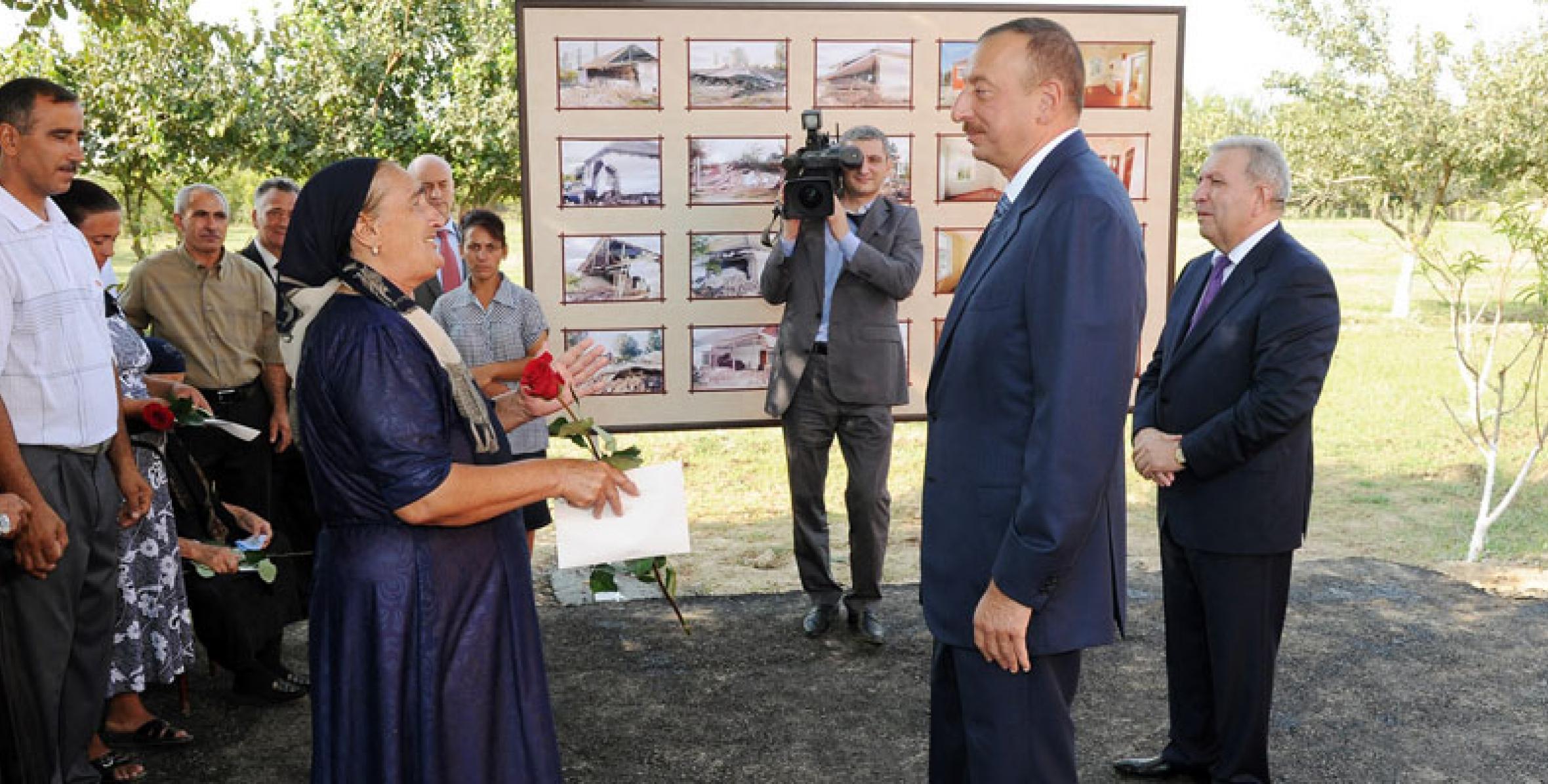 Ilham Aliyev attended a ceremony to open new apartments for flood victims