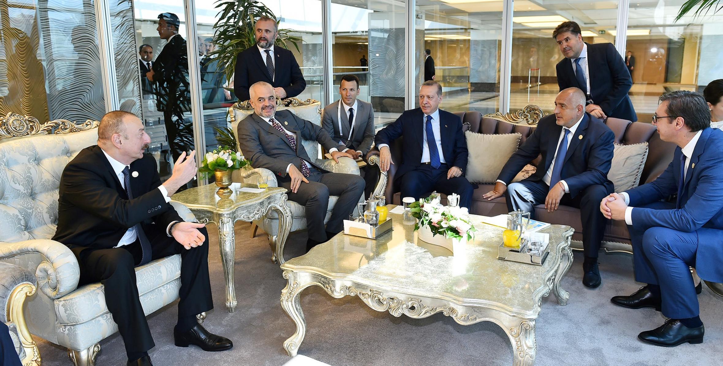 Ilham Aliyev, President Recep Tayyip Erdogan and heads of state and government attending 22nd World Petroleum Congress had a brief talk