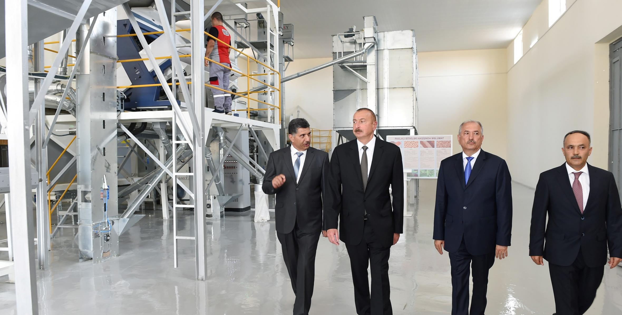 Ильхам Алиев принял участие в открытии предприятия по очистке и фасовке зерновых и бобовых растений ООО «Авангард»