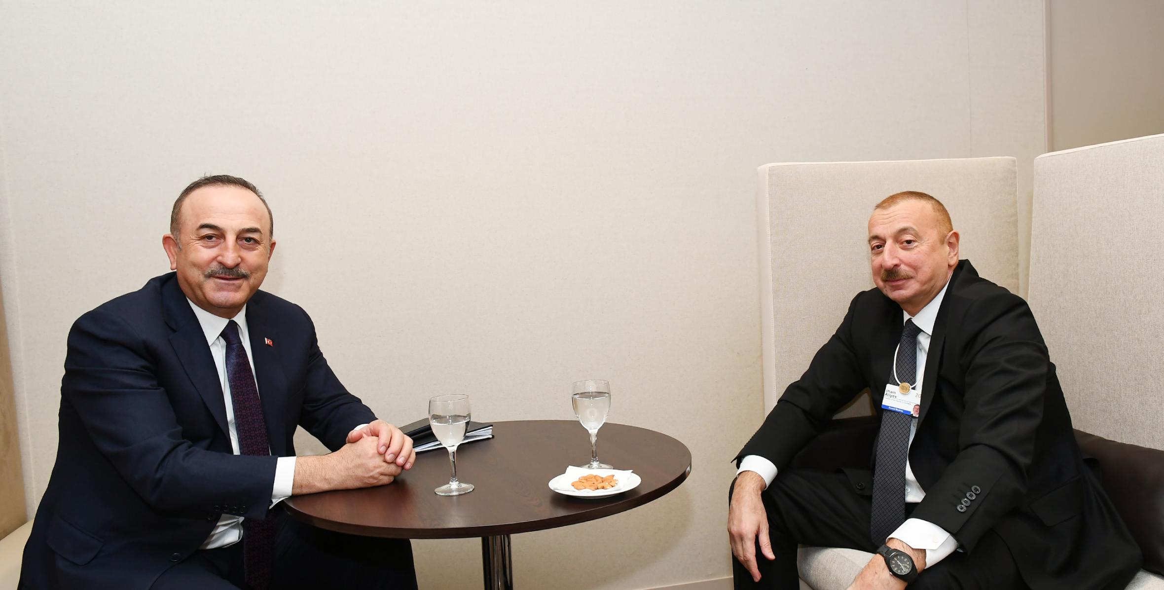 Ilham Aliyev met with Turkish Foreign Minister in Davos