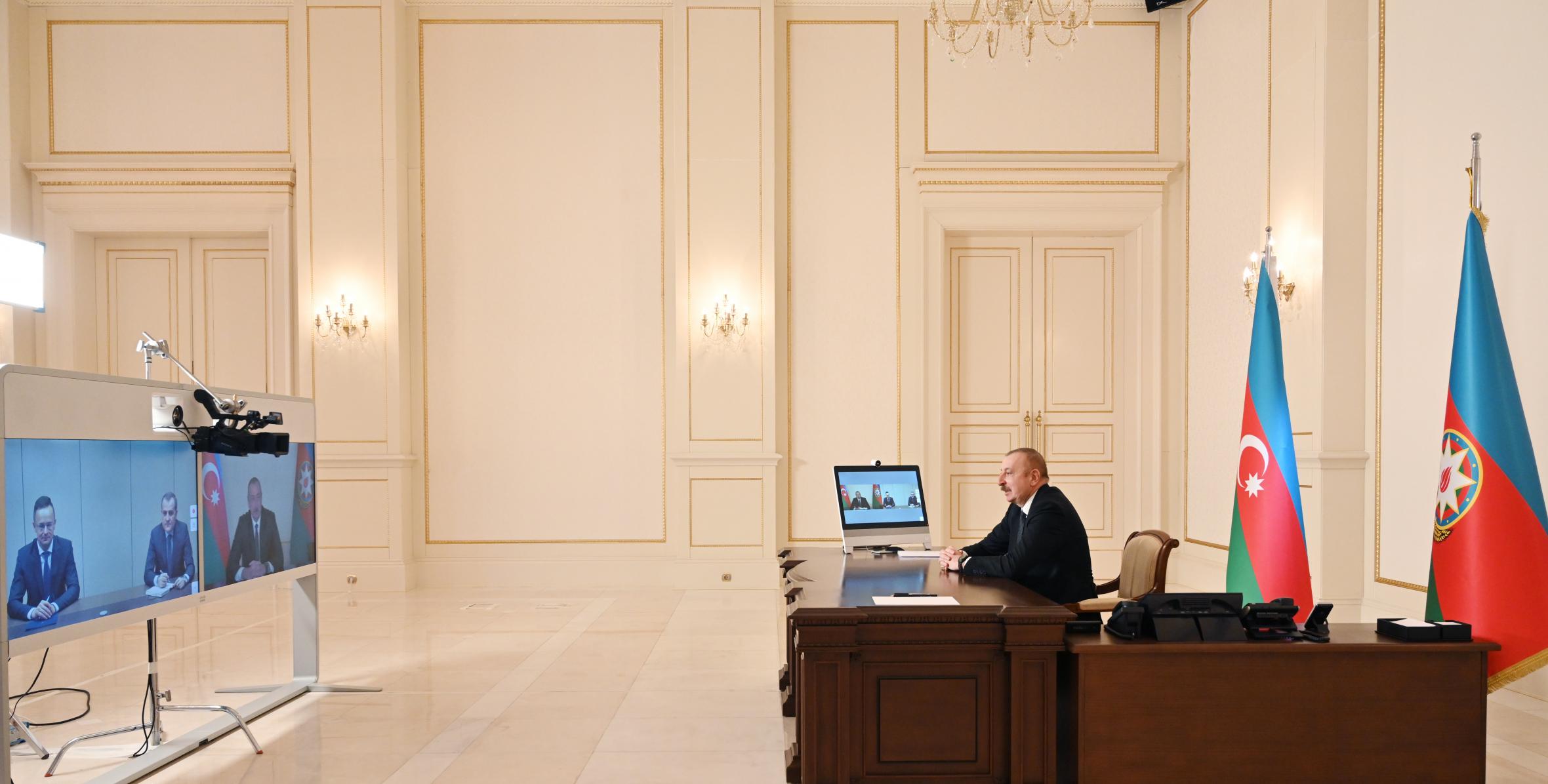 Ilham Aliyev received in a video format Hungarian Minister of Foreign Affairs and Trade