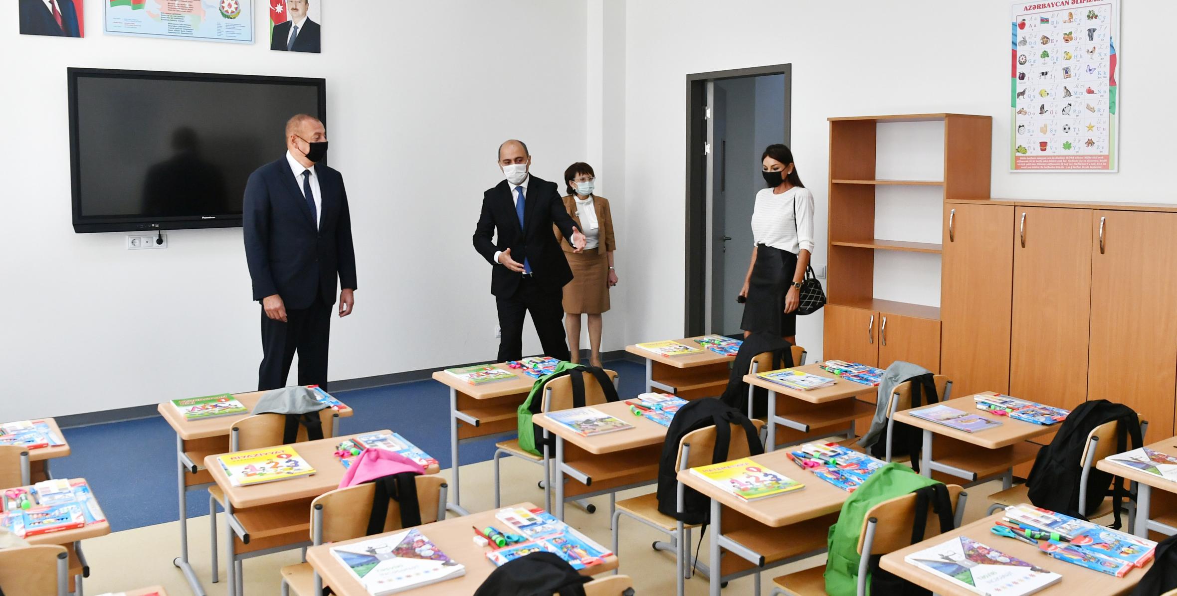 Ильхам Алиев и первая леди Мехрибан Алиева приняли участие в открытии нового здания Бакинского Европейского лицея