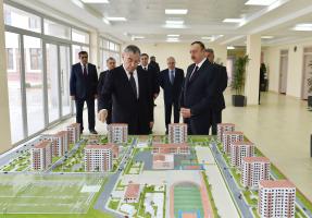 Ilham Aliyev reviewed a newly-built residential complex for IDP families in Mingachevir