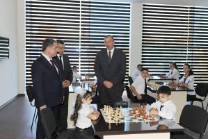 Ilham Aliyev attended the opening a chess school in Beylagan