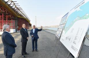 Ilham Aliyev reviewed the progress of construction at a bridge, which will link Pirallahi Island with the Absheron peninsula, and a conceptual plan of Pirallahi district