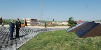 Ilham Aliyev reviewed the Flag Square in a park in the Gobustan district center