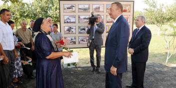 Ilham Aliyev attended a ceremony to open new apartments for flood victims