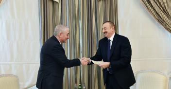 Chairman of Central Election Commission Mazahir Panahov presented presidential candidate certificate to Ilham Aliyev