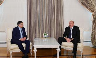 Ilham Aliyev received chairman and CEO of Baker Hughes, a GE company