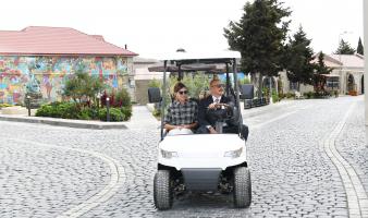 Ilham Aliyev and First Lady Mehriban Aliyeva viewed landscaping work carried out in the Balakhani settlement
