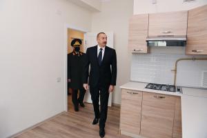 Ilham Aliyev viewed the apartments built by MIDA for martyr families and servicemen