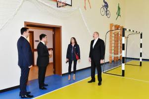 Ilham Aliyev and First Lady Mehriban Aliyeva have attended the opening of newly-built school in Neftchala district