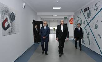 Ильхам Алиев принял участие в открытии в поселке Бум Габалинского района нового здания полной средней школы